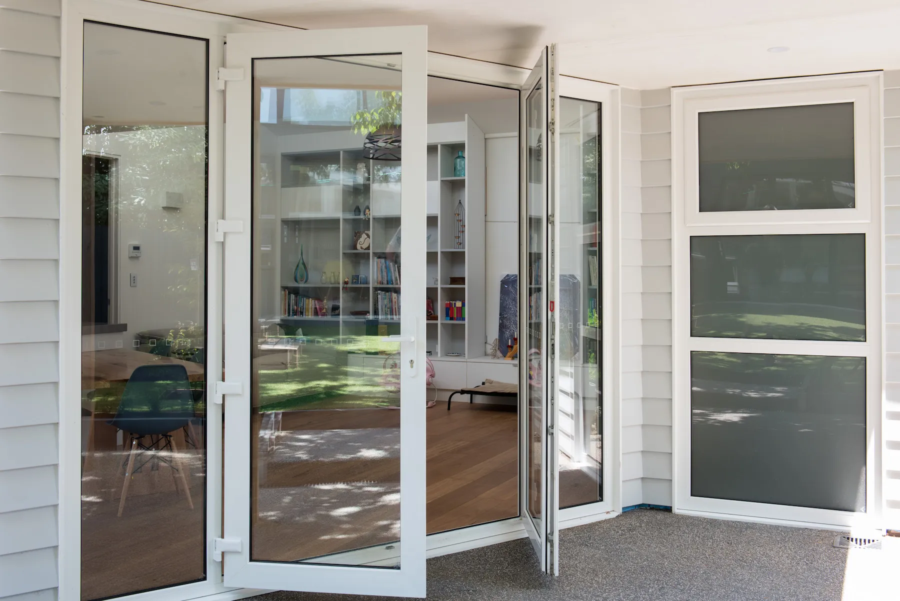 open upvc entry and french doors leading to lounge area