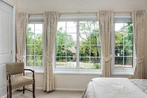 Full shot of double glazed architectural uPVC windows in the bedroom
