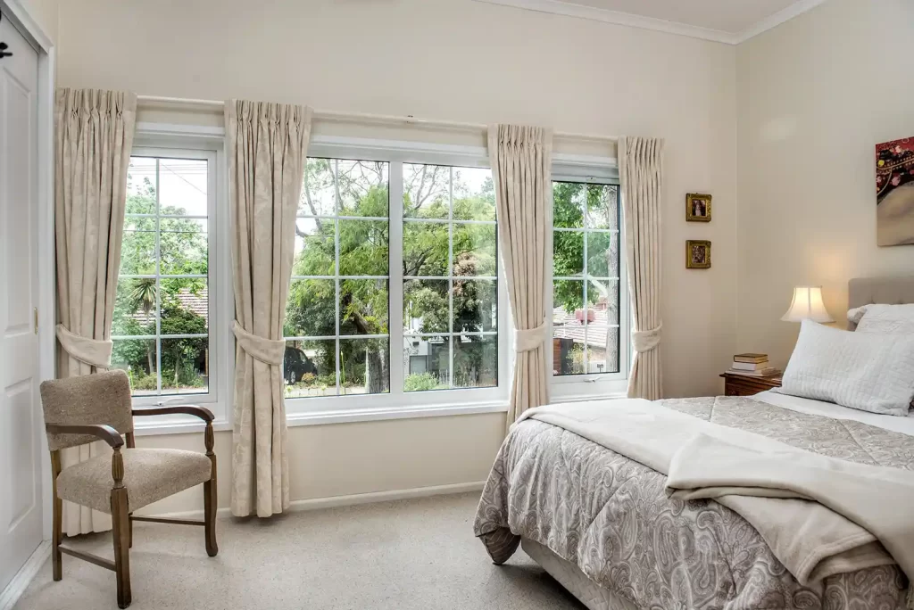 Full shot of double glazed architectural uPVC windows in the bedroom